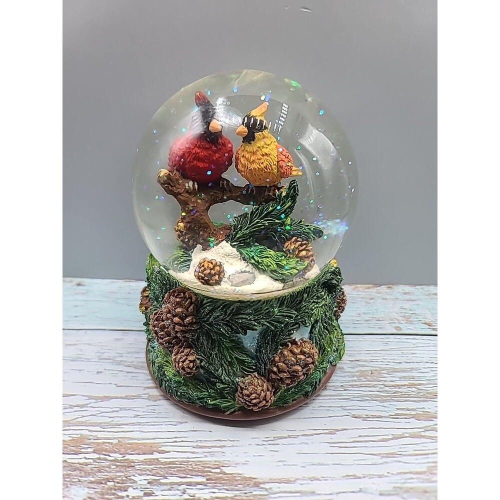 Sankyo Musical Cardinal Pine Cones Glittery Snow Globe. Plays Winter Wonderland.